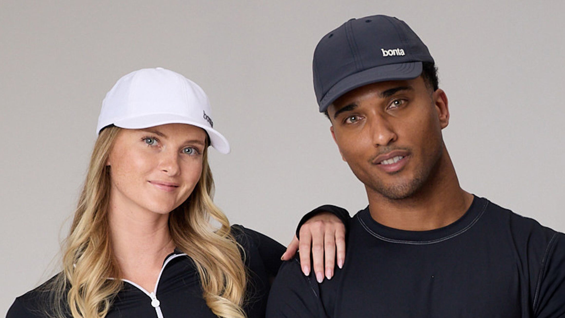 Bonta STADIO cap on a woman and man in color matte-grey and white