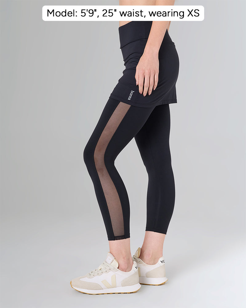 CATANIA in color Black, side detail, Model: 5'9", 25" waist, wearing XS