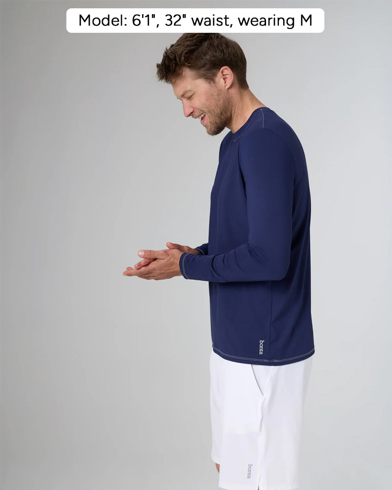 RIVIERA in color mare-blu, side view, Model: 6'1", 32: waist, wearing M