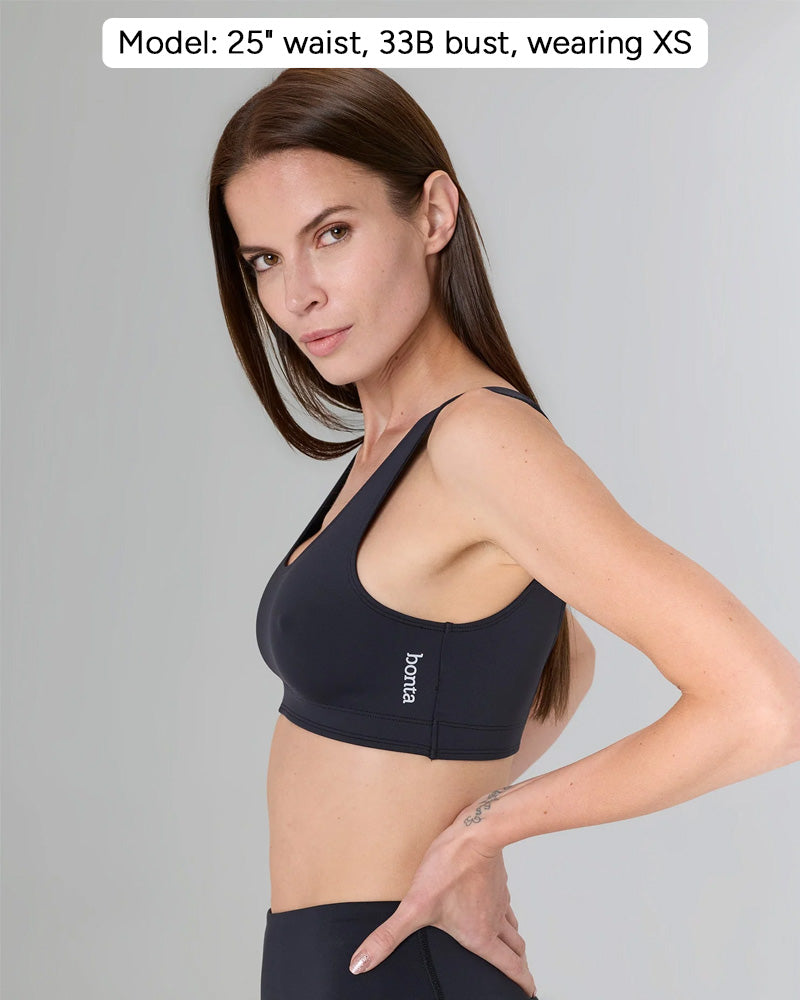 Corso in color Nero, side view, Model: 25" waist, 33B bust, wearing XS